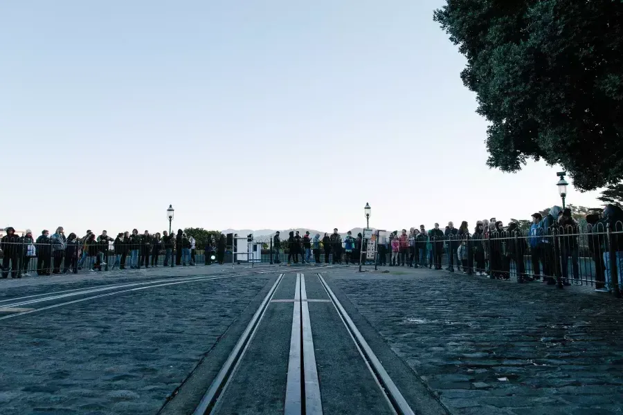 A crowd waiting in line for the cable car.