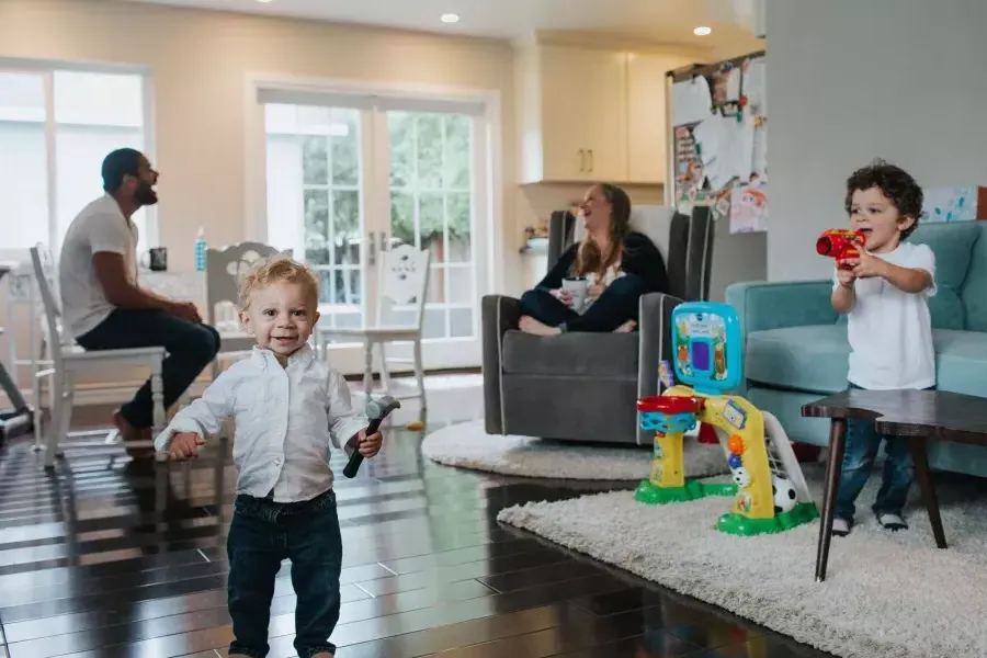 Romulo Melo's sons playing in the living room.