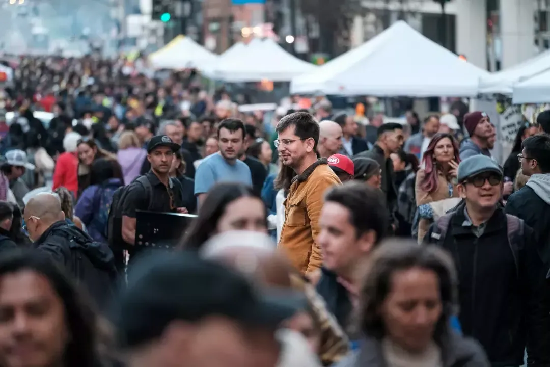 Crowds of people attending Downtown First Thursdays